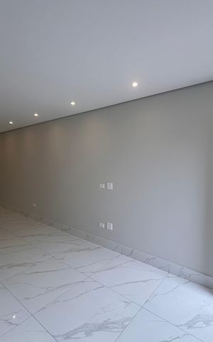 Casa à venda com 100m², 3 quartos e 2 vagas Casa à venda com 100m², 3 quartos e 2 vagasSala