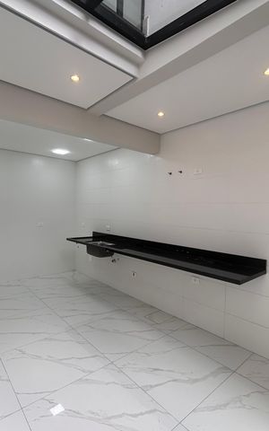 Casa à venda com 100m², 3 quartos e 2 vagas Casa à venda com 100m², 3 quartos e 2 vagasCozinha