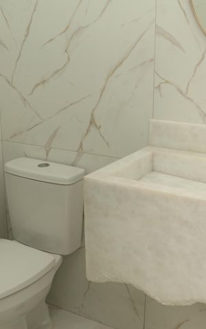 Casa de condomínio à venda com 125m², 3 quartos e 2 vagasLavabo