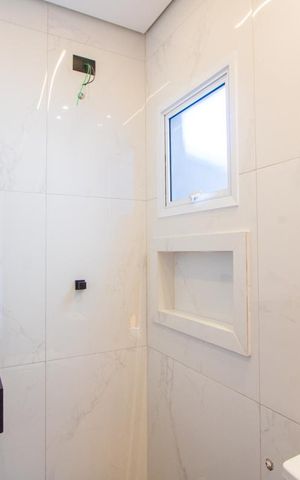 Casa à venda com 104m², 3 quartos e 2 vagas Casa à venda com 104m², 3 quartos e 2 vagasBanheiro social