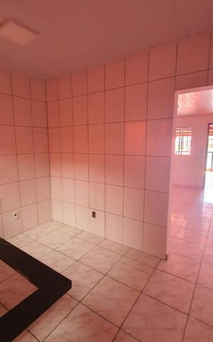 Casa à venda com 120m², 4 quartos e 2 vagas Casa à venda com 120m², 4 quartos e 2 vagasCozinha