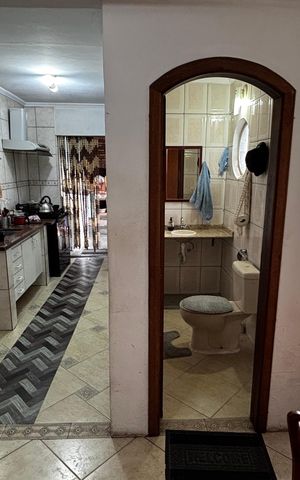 Casa à venda com 233m², 4 quartos e 2 vagas Casa à venda com 233m², 4 quartos e 2 vagasCozinha