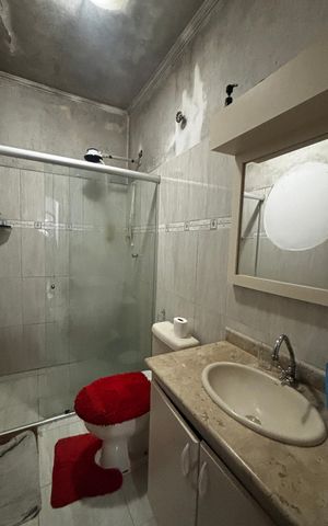 Casa à venda com 233m², 4 quartos e 2 vagas Casa à venda com 233m², 4 quartos e 2 vagasBanheiro