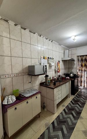 Casa à venda com 233m², 4 quartos e 2 vagas Casa à venda com 233m², 4 quartos e 2 vagasCozinha