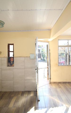 Casa à venda com 100m², 3 quartos e 2 vagasSala