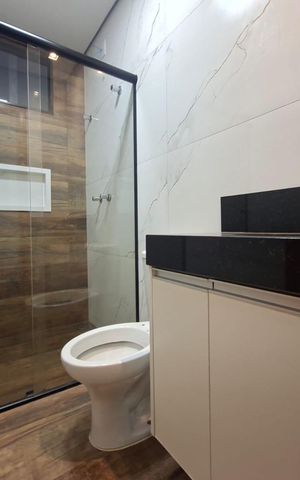 Casa à venda com 105m², 3 quartos e 4 vagasBanheiro 2