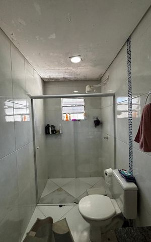 Casa à venda com 198m², 2 quartos e 2 vagas Casa à venda com 198m², 2 quartos e 2 vagasBanheiro da Suíte