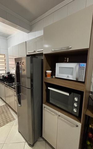 Casa à venda com 198m², 2 quartos e 2 vagas Casa à venda com 198m², 2 quartos e 2 vagasCozinha