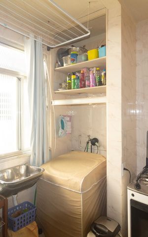 Apartamento à venda com 50m², 2 quartos e 1 vaga Apartamento à venda com 50m², 2 quartos e 1 vagaCozinha e Área de Serviço