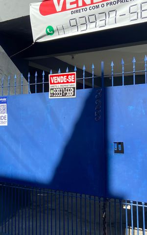 Casa à venda com 300m², 5 quartos e 2 vagasFachada e Placa