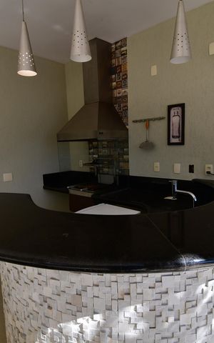 Casa de condomínio para alugar com 472m², 4 quartos e 4 vagasVaranda gourmet