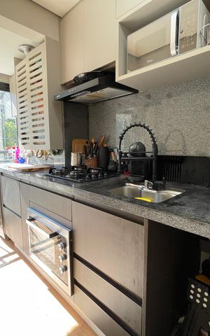 Apartamento à venda com 44m², 2 quartos e 1 vaga Apartamento à venda com 44m², 2 quartos e 1 vagaCozinha e Área de Serviço
