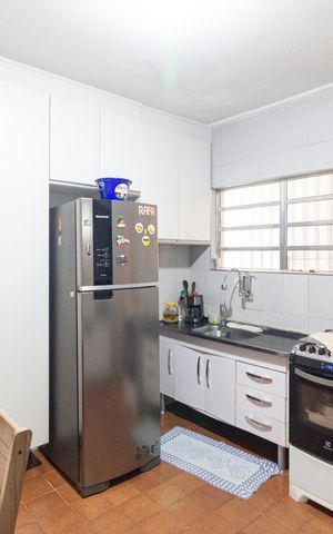 Casa à venda com 125m², 2 quartos e 2 vagas Casa à venda com 125m², 2 quartos e 2 vagasCozinha