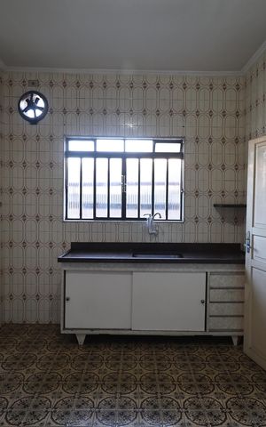 Casa à venda com 156m², 2 quartos e 3 vagas Casa à venda com 156m², 2 quartos e 3 vagasCozinha