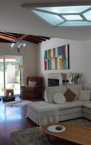 Casa de condomínio à venda com 313m², 4 quartos e 4 vagasSala de Estar