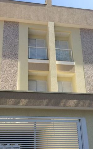 Casa de condomínio para alugar com 56m², 2 quartos e 1 vaga Casa de condomínio para alugar com 56m², 2 quartos e 1 vagaFachada