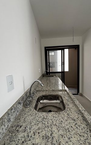 Apartamento à venda com 56m², 2 quartos e 2 vagas Apartamento à venda com 56m², 2 quartos e 2 vagasCozinha e Área de Serviço