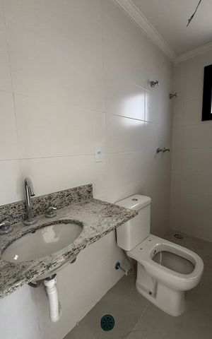 Apartamento à venda com 56m², 2 quartos e 2 vagas Apartamento à venda com 56m², 2 quartos e 2 vagasBanheiro da Suíte