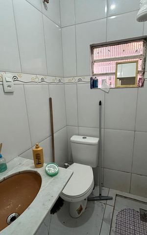 Casa à venda com 80m², 2 quartos e sem vagaBanheiro do Quarto 2 - Suíte