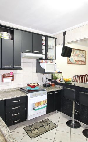 Casa à venda com 280m², 4 quartos e 4 vagasSala / Cozinha