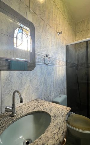 Casa à venda com 400m², 4 quartos e 6 vagas Casa à venda com 400m², 4 quartos e 6 vagasBanheiro da Suíte
