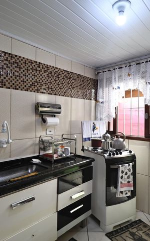 Casa à venda com 138m², 2 quartos e 2 vagas Casa à venda com 138m², 2 quartos e 2 vagasCozinha