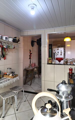 Casa à venda com 138m², 2 quartos e 2 vagas Casa à venda com 138m², 2 quartos e 2 vagasCozinha