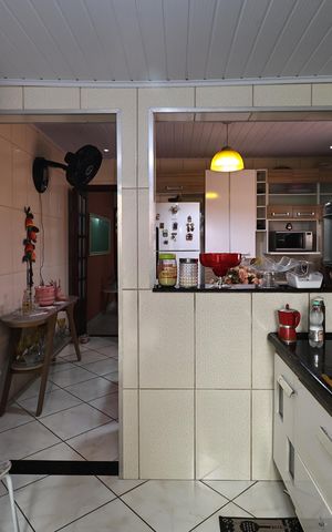 Casa à venda com 138m², 2 quartos e 2 vagas Casa à venda com 138m², 2 quartos e 2 vagasCozinha