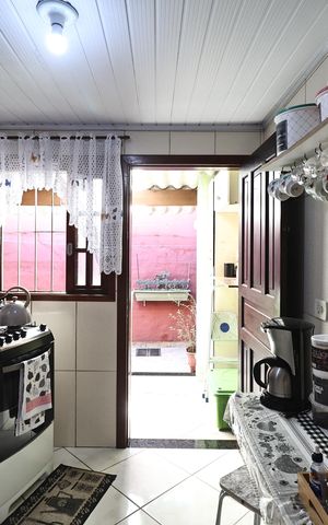 Casa à venda com 138m², 2 quartos e 2 vagas Casa à venda com 138m², 2 quartos e 2 vagasCozinha