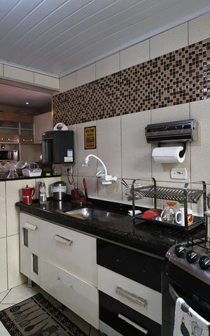 Casa à venda com 138m², 2 quartos e 2 vagas Casa à venda com 138m², 2 quartos e 2 vagasCozinha