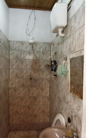 Casa à venda com 300m², 6 quartos e 2 vagasBanheiro