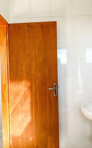 Casa de condomínio para alugar com 70m², 2 quartos e 1 vaga Casa de condomínio para alugar com 70m², 2 quartos e 1 vagaBanheiro da Suíte 1