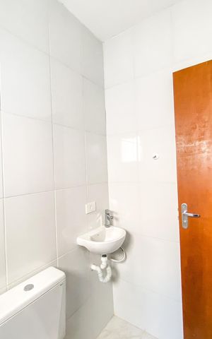 Casa de condomínio para alugar com 70m², 2 quartos e 1 vaga Casa de condomínio para alugar com 70m², 2 quartos e 1 vagaBanheiro da Suíte 2