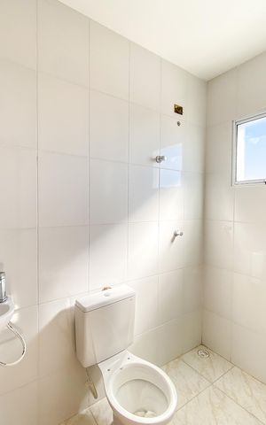 Casa de condomínio para alugar com 70m², 2 quartos e 1 vaga Casa de condomínio para alugar com 70m², 2 quartos e 1 vagaBanheiro da Suíte 1