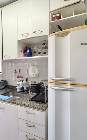 Apartamento à venda com 56m², 2 quartos e 1 vaga Apartamento à venda com 56m², 2 quartos e 1 vagaCozinha