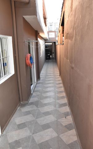Casa à venda com 154m², 4 quartos e 2 vagascorredor de acesso a garagem