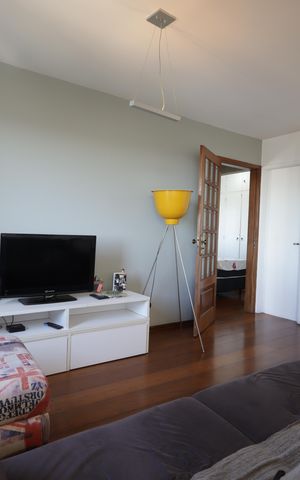 Apartamento à venda com 74m², 2 quartos e 1 vagaSala de TV