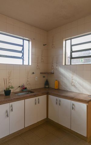 Casa à venda com 138m², 3 quartos e 2 vagas Casa à venda com 138m², 3 quartos e 2 vagasCozinha