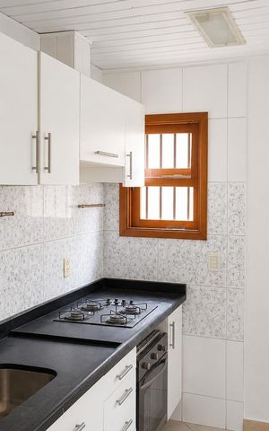 Casa à venda com 115m², 4 quartos e 1 vaga Casa à venda com 115m², 4 quartos e 1 vagaCozinha