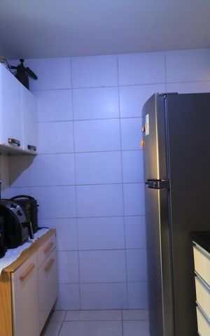 Apartamento à venda com 58m², 2 quartos e 1 vaga Apartamento à venda com 58m², 2 quartos e 1 vagaCozinha e Área de Serviço