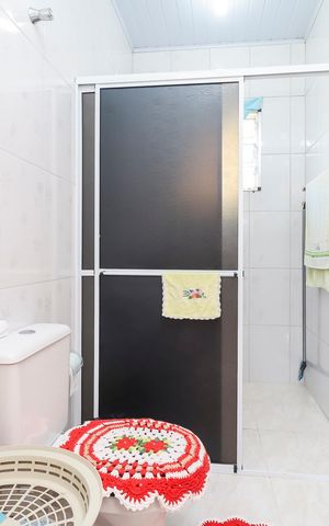 Casa à venda com 120m², 3 quartos e 2 vagasCasa 1 - Banheiro da Suíte