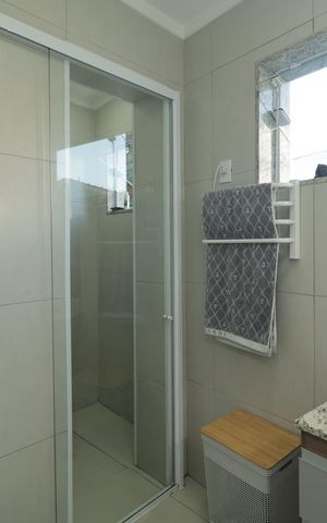 Casa à venda com 250m², 4 quartos e 2 vagasBanheiro da Suíte 2