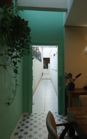 Casa à venda com 250m², 4 quartos e 2 vagasCorredor do quintal