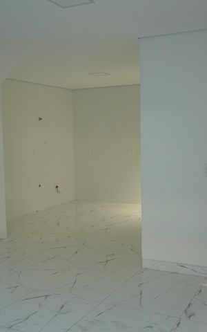 Casa de condomínio à venda com 130m², 3 quartos e 2 vagasSala