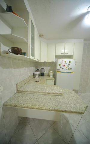 Casa à venda com 125m², 2 quartos e 2 vagasCozinha 