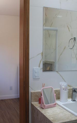 Casa à venda com 300m², 4 quartos e 4 vagasBanheiro da Suíte 2