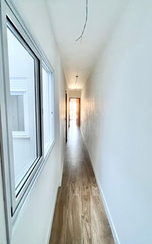 Casa à venda com 145m², 3 quartos e 2 vagas Casa à venda com 145m², 3 quartos e 2 vagasCorredor