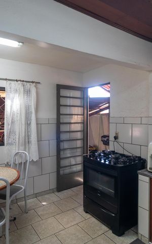 Casa à venda com 99m², 3 quartos e 2 vagas Casa à venda com 99m², 3 quartos e 2 vagasCozinha
