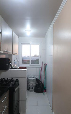 Apartamento à venda com 61m², 2 quartos e 1 vagaCozinha e Área de Serviço