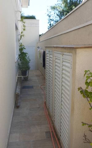 Casa de condomínio à venda com 401m², 4 quartos e 4 vagasÁrea Externa